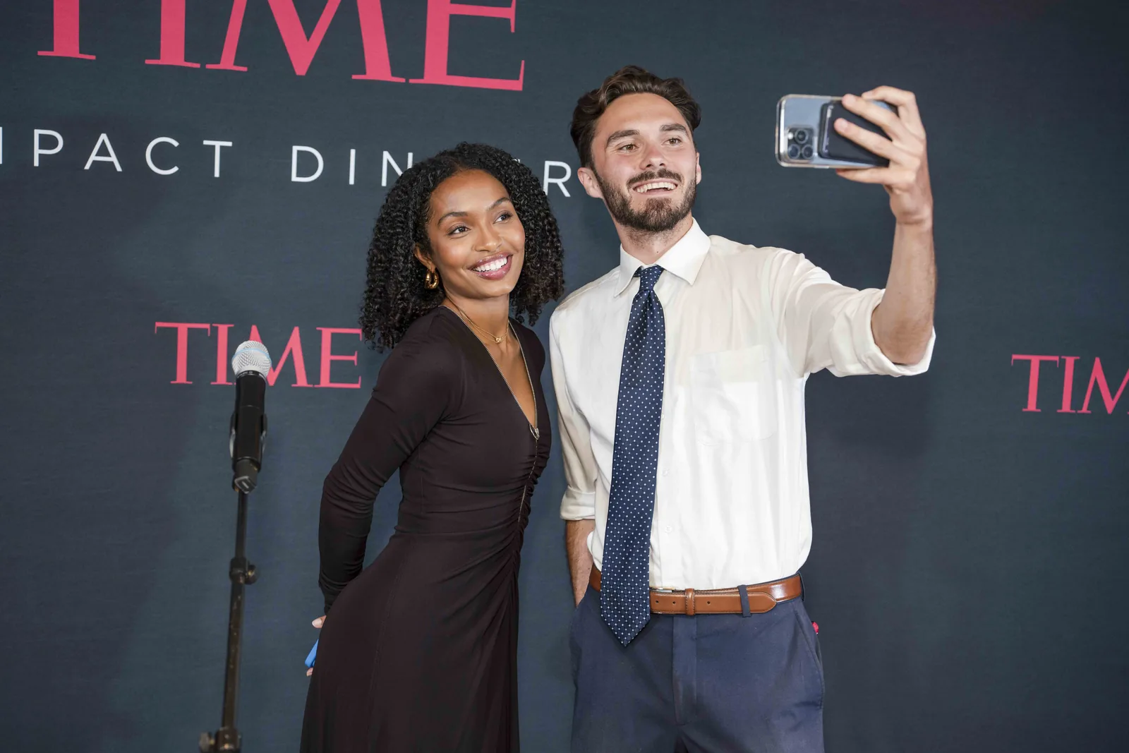 On the step and repeat, TIME Impact Dinner